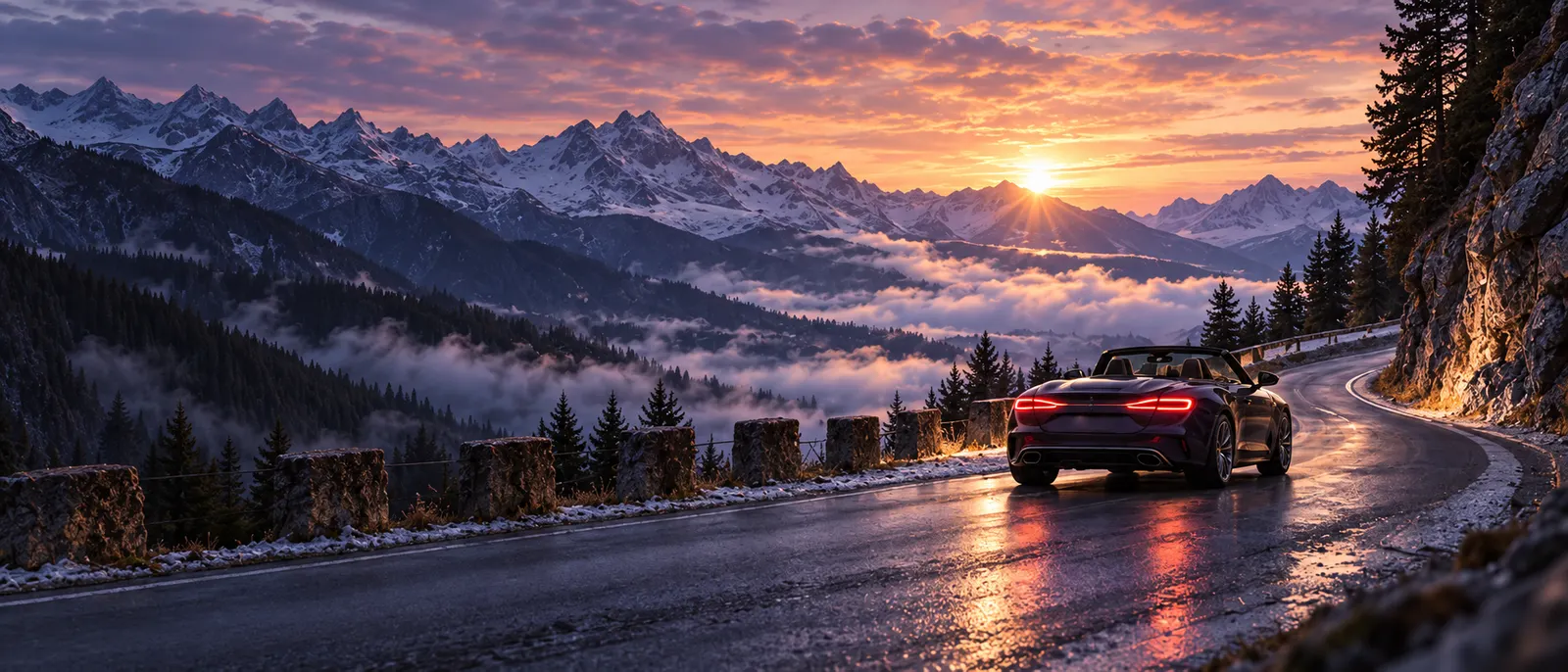 A dark plum convertible with the roof down on a winding Alpine road at first light, the sun on the horizon and mist below